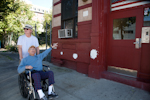 Irv points out a building that is like the one where he grew up. Photo by Pat Arnow