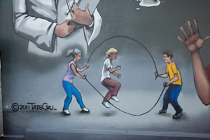 Mural by Tats Cru, graffiti artists, Tremont Ave., Bronx. Photo by Pat Arnow