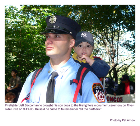 911 Fire Memorial observation by father and son. Photo by Pat Arnow