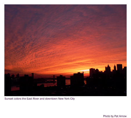 Sunset colors the East River and downtown New York City, Photo by Pat Arnow